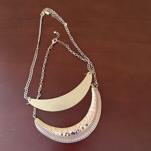 Set of two gold collar necklaces.